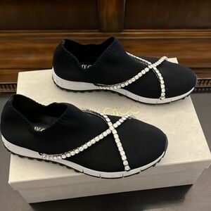 Black knit sneaker with Crystal trim.